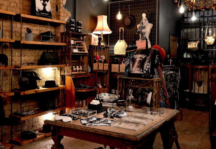 Vintage retail store interior with shelves and display tables