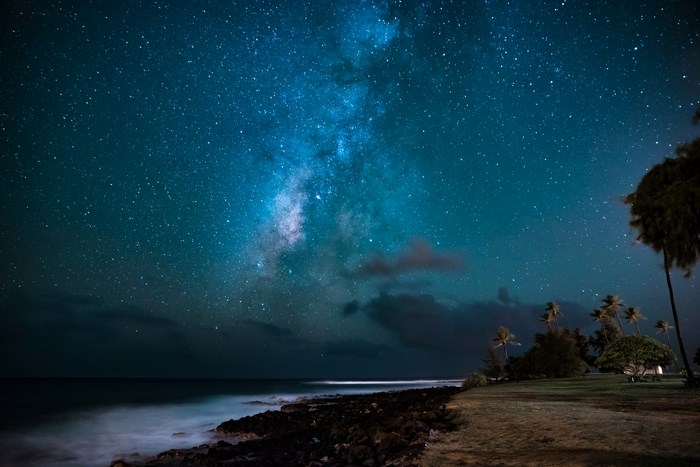 Starry Night Sky Over Hawaiian Coastline