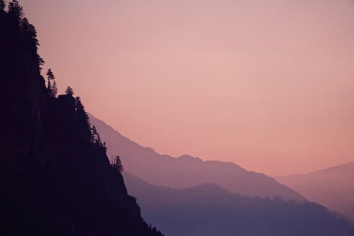 Mountain range silhouette at sunset