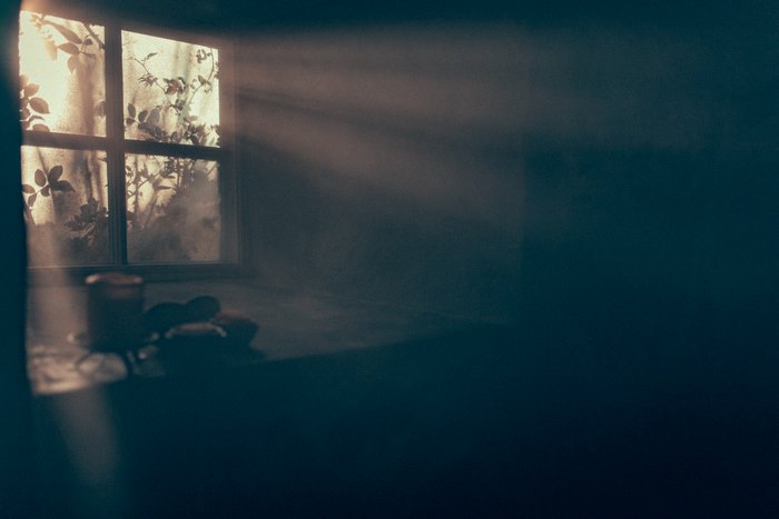 Sunlight streaming through a window onto a windowsill