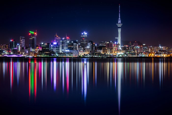 Auckland skyline at night with reflections