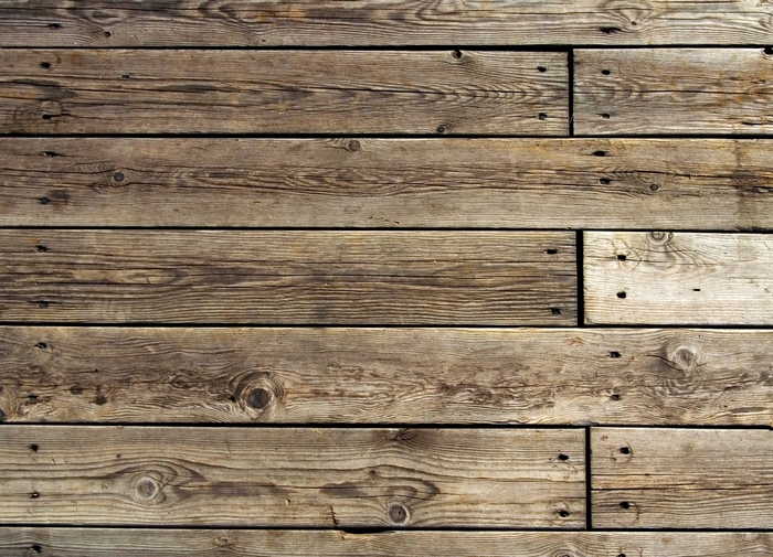 Weathered wooden planks with visible grain and knots