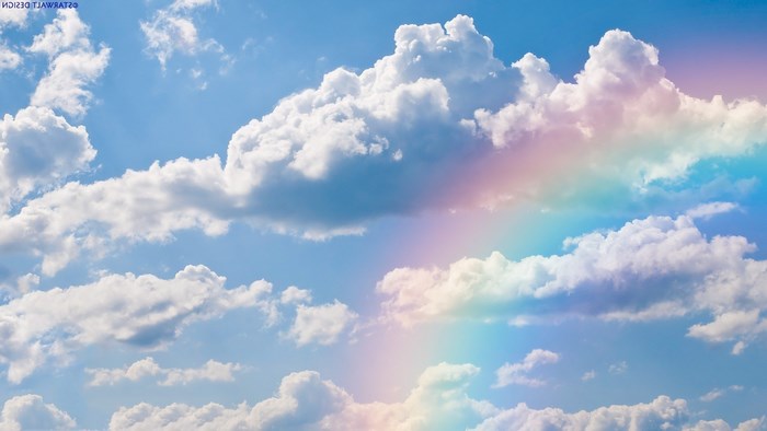 Rainbow and clouds in the sky