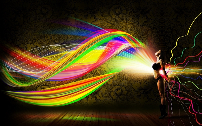 Woman emitting rainbow light waves