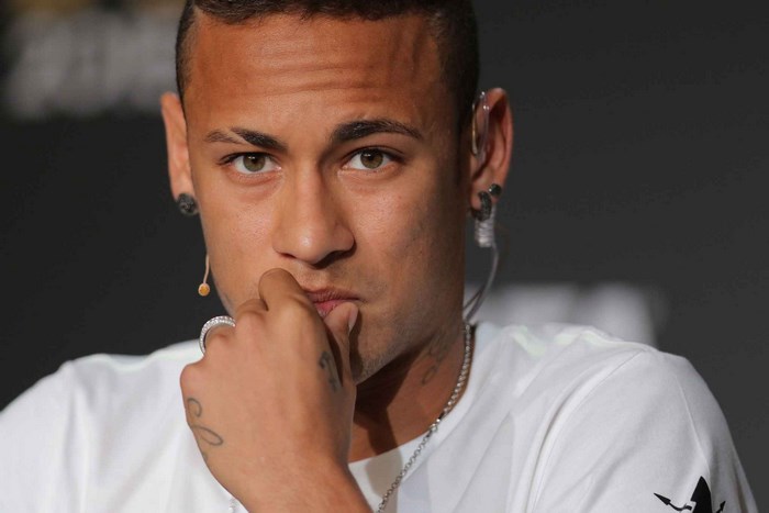 Neymar Jr. wearing a white t-shirt