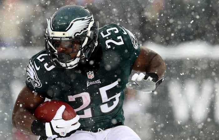 Philadelphia Eagles Player Running in Snowy Game