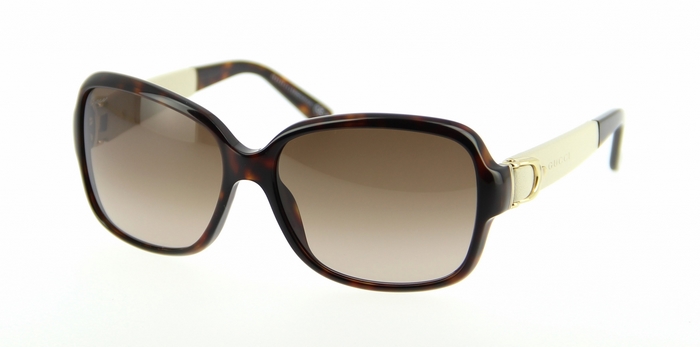 Gucci sunglasses with tortoise shell frames and gold accents