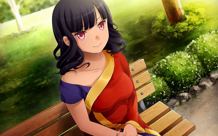 Girl in a Sari Sitting on a Park Bench