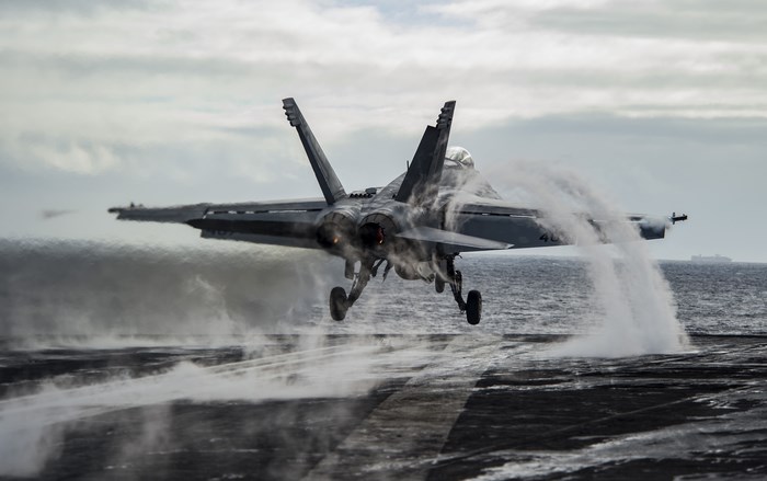 McDonnell Douglas FA-18 Hornet landing on aircraft carrier