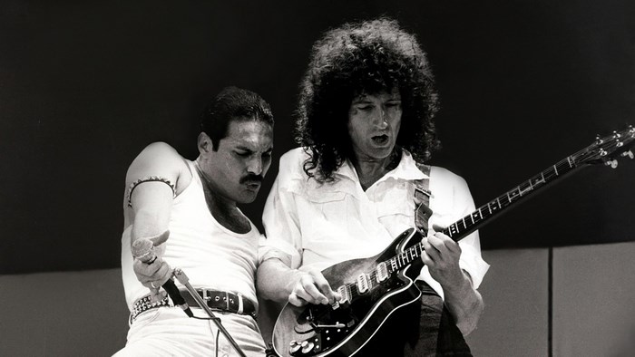 Freddie Mercury and Brian May of Queen performing live