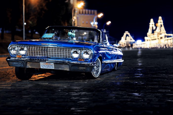Blue 1963 Chevrolet Impala Convertible at Night