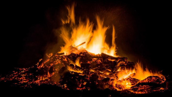 Intense Glowing Campfire at Night