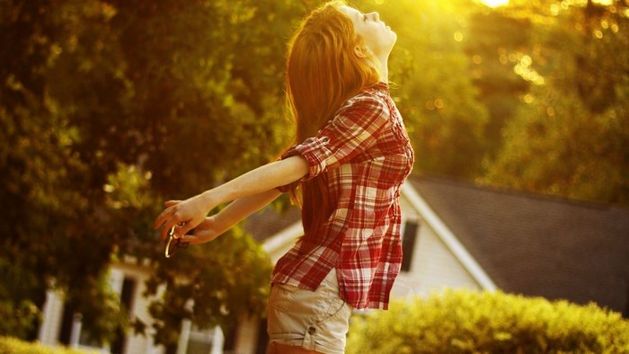 Girl in Plaid Shirt Enjoying Sunlight