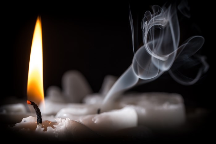 Candle flame and smoke