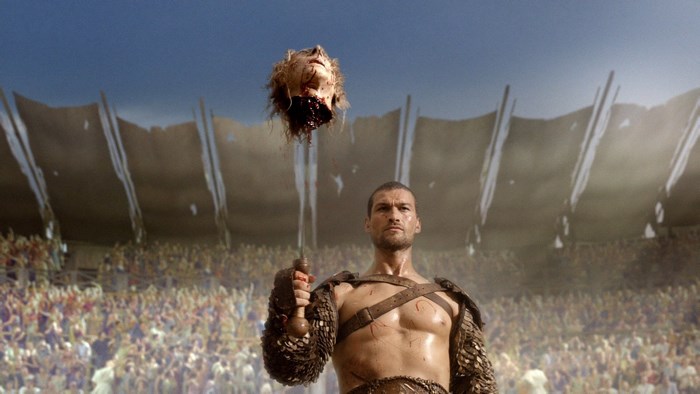 Spartacus Gladiator Holding Severed Head in Arena