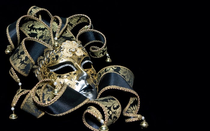 Gold and black jester mask with bells