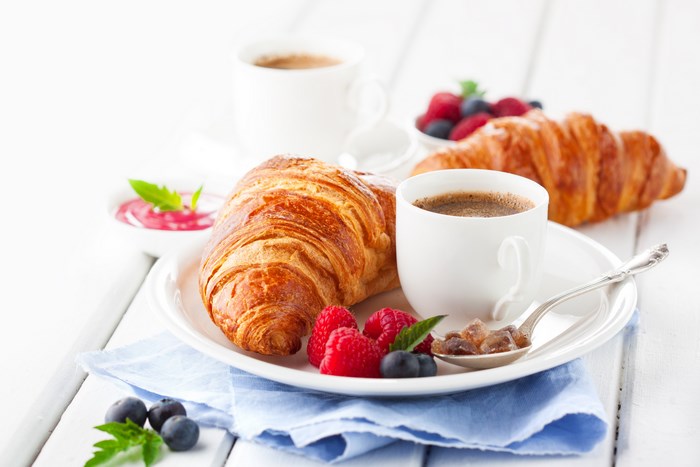 Breakfast with croissants and coffee