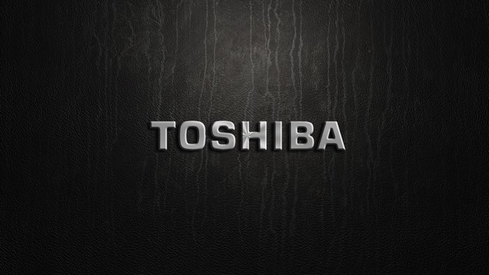 Toshiba logo on a textured black background