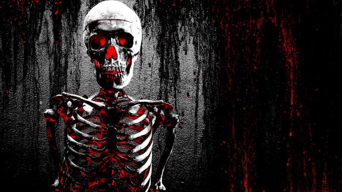 Skeleton with red glowing eyes and ribs