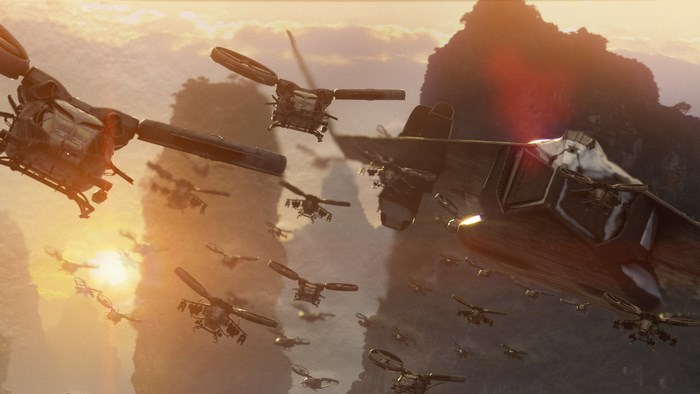 Aircraft flying over mountains at sunset