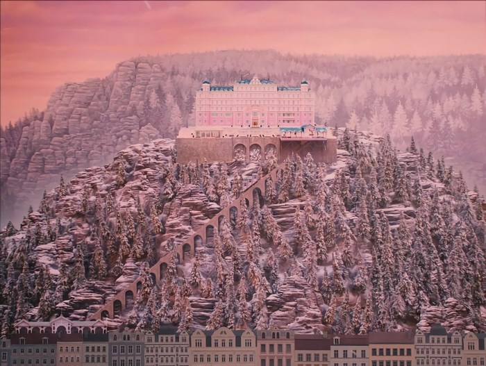 The Grand Budapest Hotel on a snowy mountain