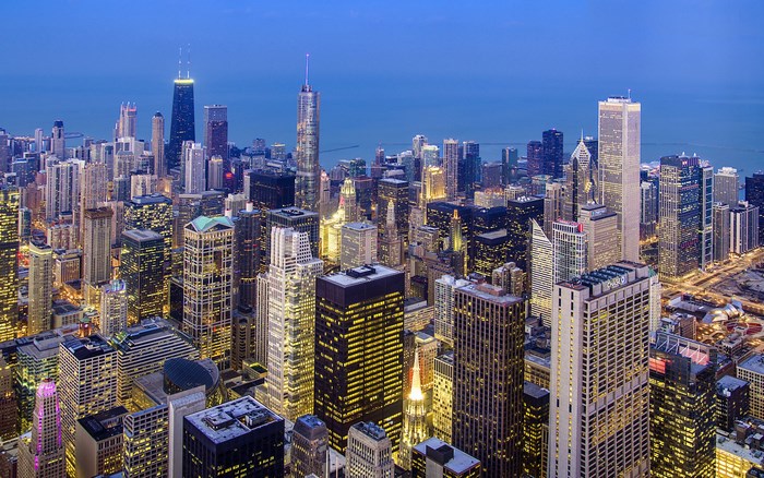 Chicago skyline at dusk with lake in background