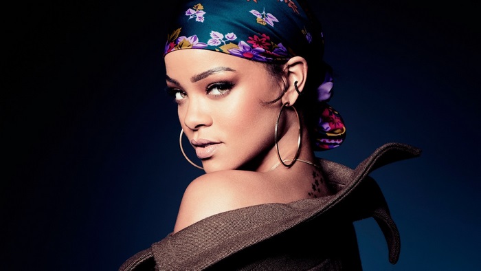 Rihanna wearing a headscarf and jacket