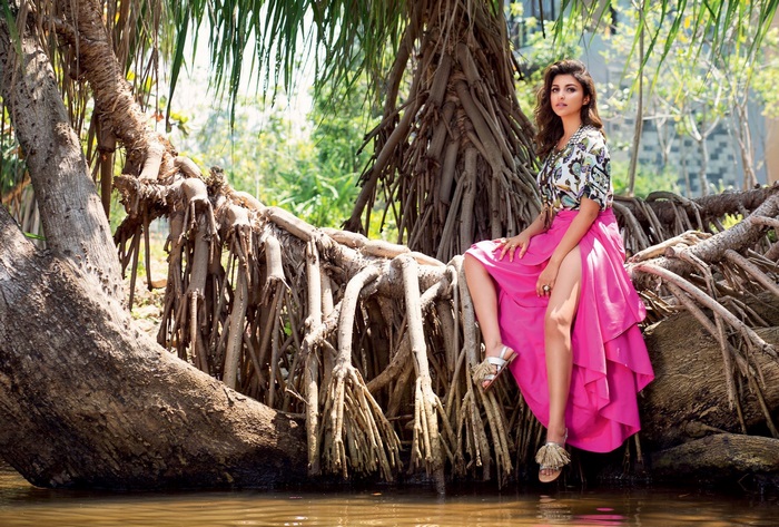 Parineeti Chopra sitting on tree roots