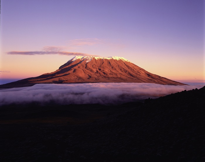 Mount Kilimanjaro at sunrise with clouds