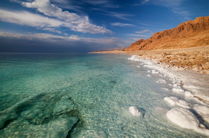 The Dead Sea with Salt Formations and Mountains