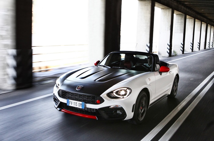 Abarth 124 Spider driving through a tunnel