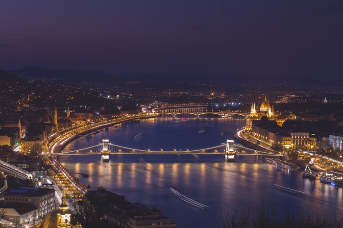 Budapest cityscape with bridges and Parliament Building at night