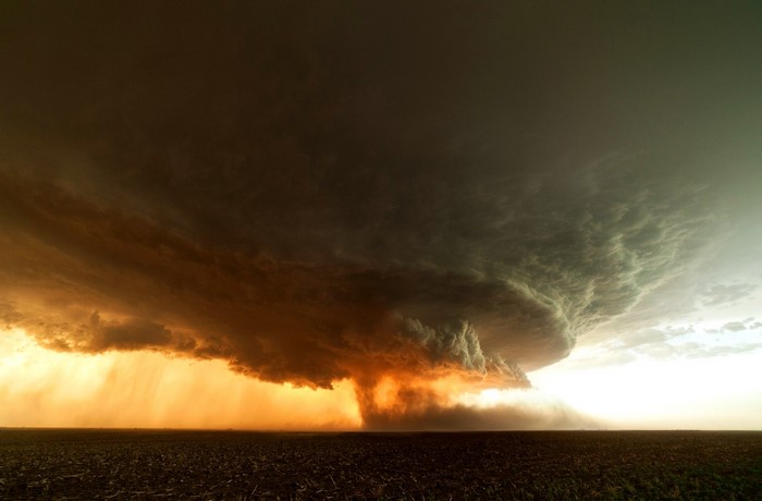Tornado storm over a field
