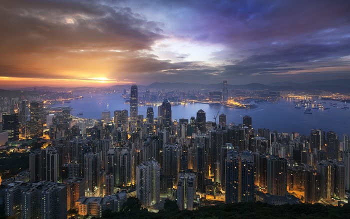 Hong Kong cityscape at sunrise with Victoria Harbour