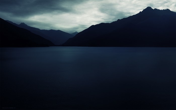 Dark Mountain Landscape Over Lake