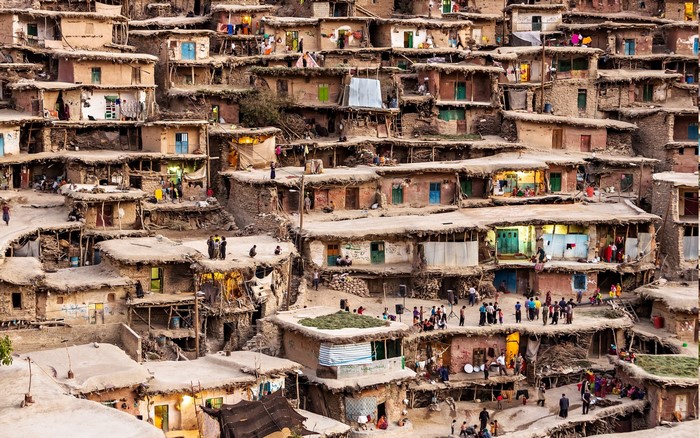A historic village in Iran with many houses and people