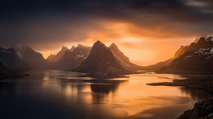Fjord landscape with mountains at sunset in Lofoten, Norway