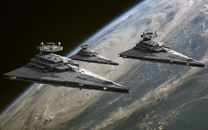 Star Wars Star Destroyers orbiting a planet