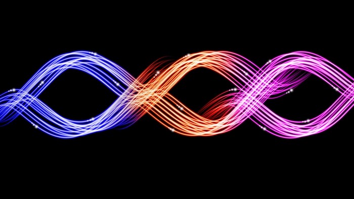 Abstract neon light waves on black background