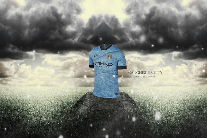 Manchester City football jersey on a rock