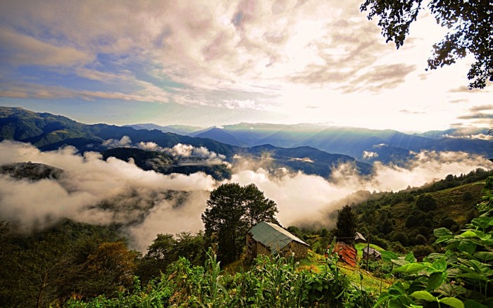 Mountain landscape with clouds and houses in Trabzon, Turkey