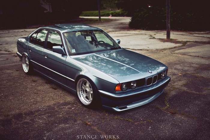 Stanced Blue BMW E34 Sedan with Custom Wheels