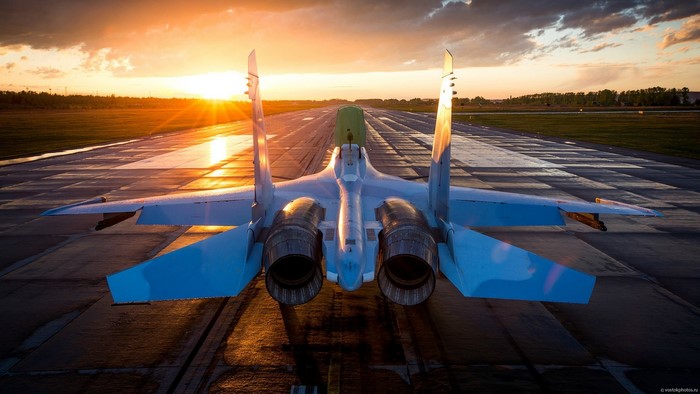 Sukhoi Su-30 Russian Air Force Jet Fighter on Runway at Sunset