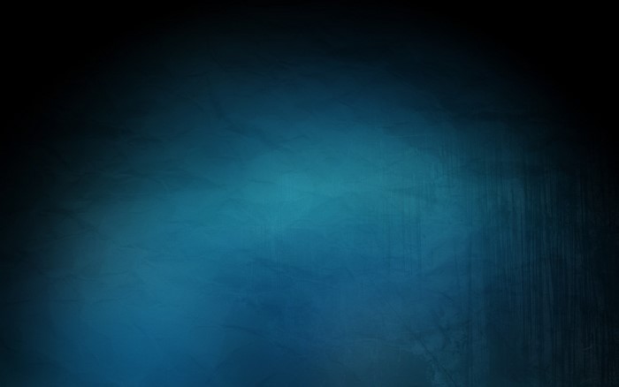 Dark blue textured background with light effects