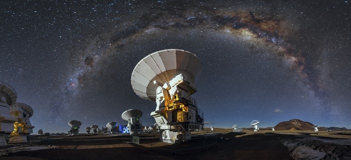 ALMA Observatory under the Milky Way in Atacama Desert, Chile