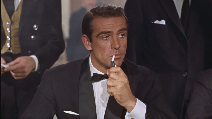 Sean Connery as James Bond smoking