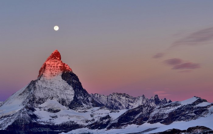 Matterhorn mountain at sunset with moon