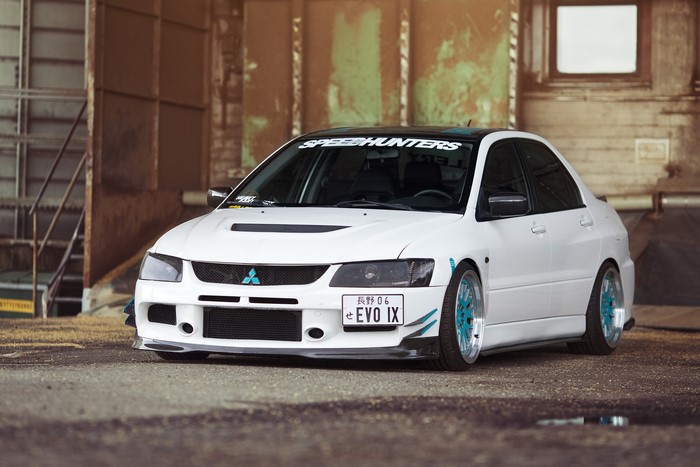 White Mitsubishi Lancer Evo IX tuned car