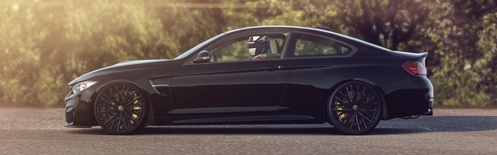 Black BMW M4 Coupe on Road