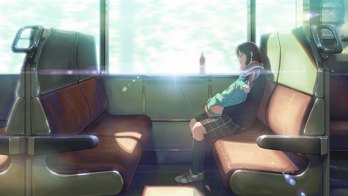 Girl Sleeping Peacefully on Train Seat